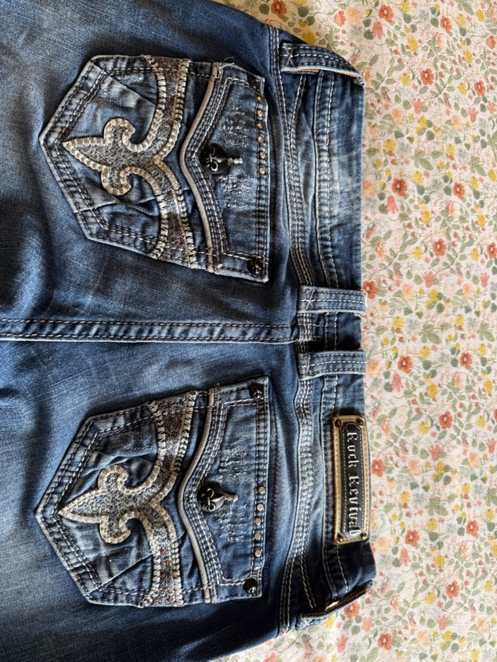 Rock Revival women’s Blue Embroidered low rise size 32 boot cut Jeans